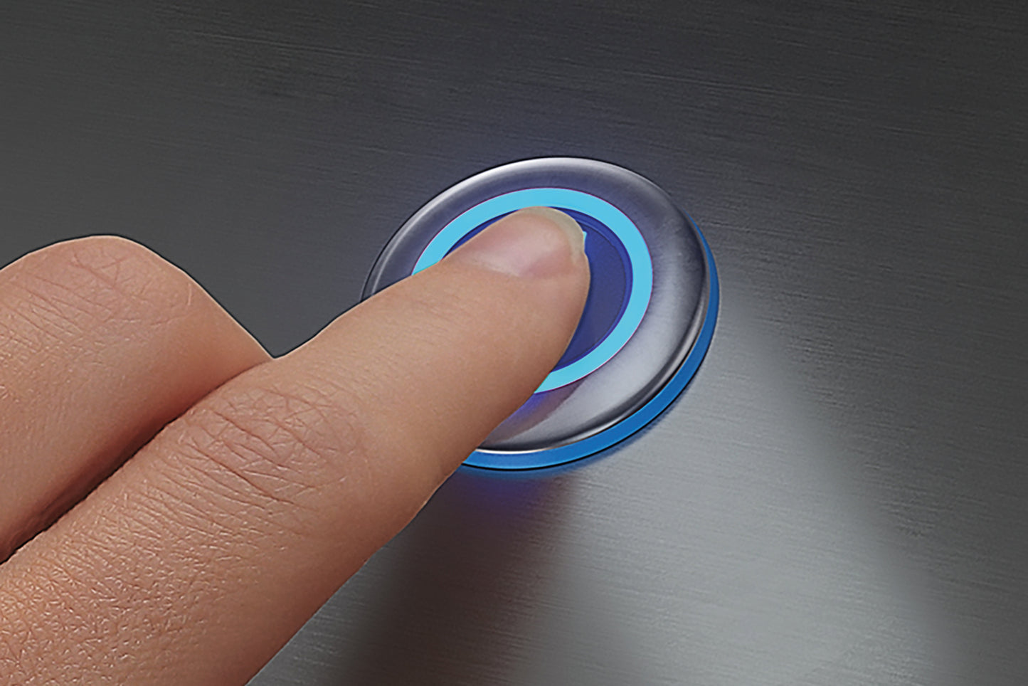 Hand pressing a button with blue light on a metallic surface