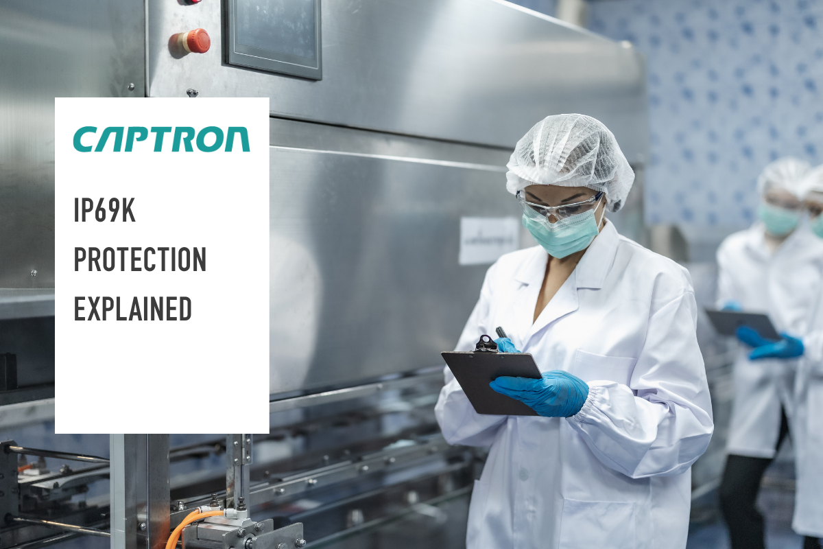 Person in a lab coat and protective gear with CAPTRON logo and text about IP69K protection.